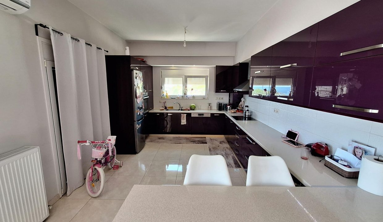 Level 3 - open-plan kitchen, dining and living area