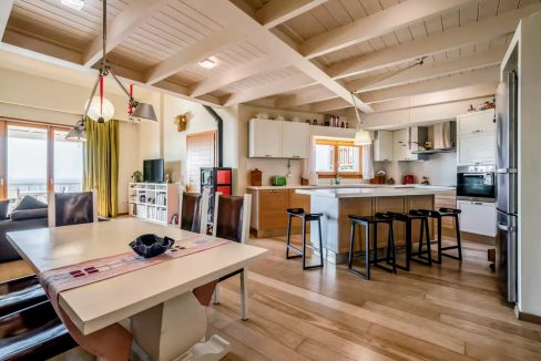 Upper ground floor - open-plan kitchen, dining, and living area