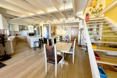 Upper ground floor - open-plan kitchen, dining, and living area