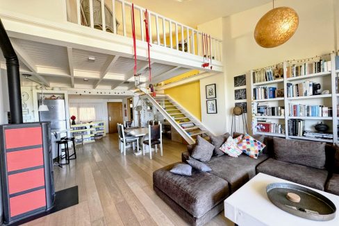 Upper ground floor - open-plan kitchen, dining, and living area