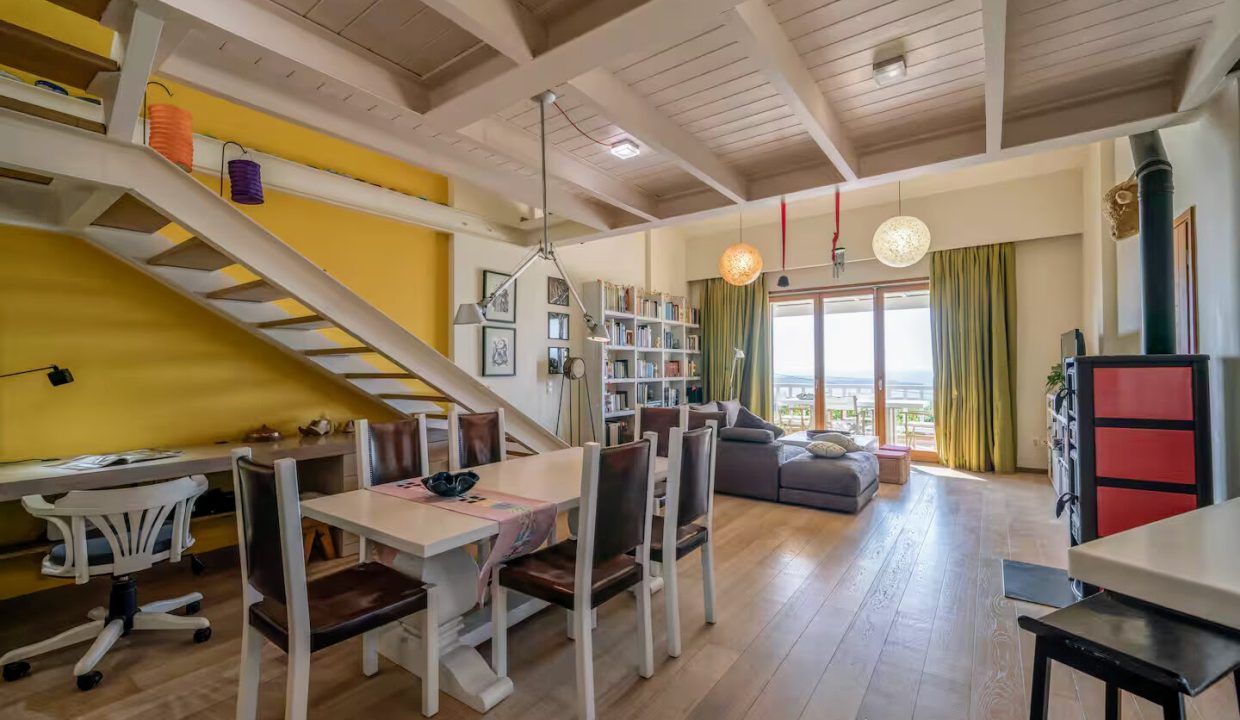 Upper ground floor - open-plan kitchen, dining, and living area